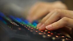 3 Shots - Hands typing on Rainbow LED Computer Keyboard Stock Footage