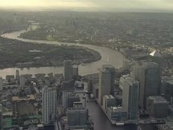 Aerial W/S City of London with Canary Wharf foreground Stock Footage