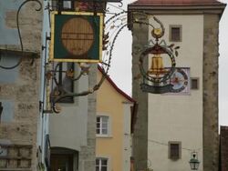 Rothenburg ob der Tauber, old iron craftships and the Sibers (Siebersturm) tower in the background Stock Footage