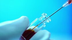 draws liquid medicine syringe and injects Stock Footage