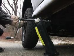 HD: Unscrewing The Tire Stock Footage