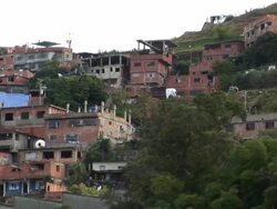 Condominiums over the slums Stock Footage