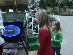 Even in these tough economic times, parents are still working hard to grant their children's Christmas wishes.  Some are doing so with a little help from Santa Claus. The AP's Rich Matthews reports from Santa's Southwestern heaquarters. Instructional Video