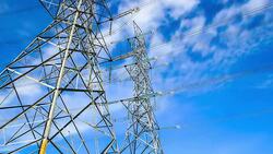 electricity high voltage power pylon against blue sky Stock Footage