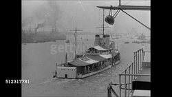 1939: NAVY FORCES IN CHINA: (POV deck) MS French battle ship. HA WS English river boat leaving port. MS Japanese sailors driving boat. WS Sail boat passing U.S. Navy battleship. Instructional Video