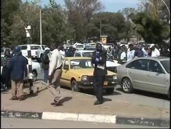 WRAP Zimbabweans queue as gov't cracks down on prices ADDS intw with CEO of BUSA News Clip