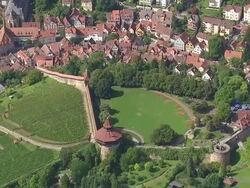 MS AERIAL TS ZI Shot of Hotel surrounding by trees in Stuttgart Region / Esslingen, Baden Wurttemberg, Germany Stock Footage