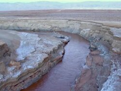  AERIAL WS TS  View of muddy surface of dead sea in desert / Sourn Judea Desert, Israel  Stock Footage