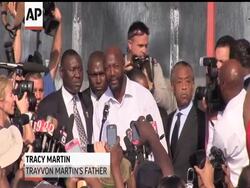 Thousands rallied in Sanford, Florida, demanding an arrest in the killing of unarmed teen Trayvon Martin. The Reverend Al Sharpton led the rally, which Martin's parents attended. News Clip