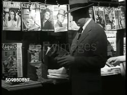 Man at news stand Japan article Instructional Video