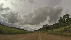 Driving down country dirt road in Colorado; personal perspective Stock Footage