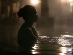 Woman enjoys hot spring Stock Footage