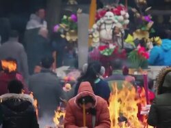 MS Shot of People burning incense in temple during chinese new year / Xi'an, Shaanxi, China Stock Footage