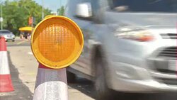 Traffic passing through roadworks in Maidstone News Clip