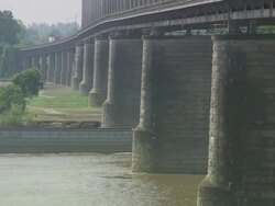 MS Cargo ship passes below bridge / Memphis, Tennessee, United States Stock Footage