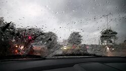 Traffic during rainy season view from inside the car Stock Footage