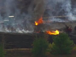 WS ARIEAL ZI ZO View of Some tractors burning blueberry fields / Maine, United States Stock Footage