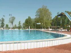 HD: Young Man Backflipping Into Swimming Pool Stock Footage