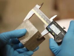 Measuring cement in lab. Stock Footage