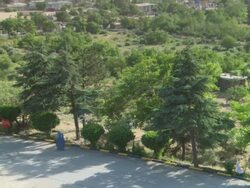 MS ZO PAN Woman walking  down on road  / Kabu,Kabul,Afghanistan Stock Footage