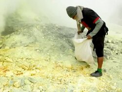 MS Miners collecting sulfur rocks / Ijen, Java, Indonesia Stock Footage