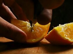 Cutting an orange Stock Footage