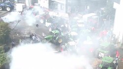 CLEAN : Tear gas water cannon at mass EU farmer protest in Brussels News Clip