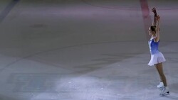TS Female figure skater bowing after performance Stock Footage