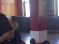 MS ZI Buddhist monk rolling beads in hand and speaking / Kathmandu, Central, Nepal Stock Footage