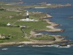 WS AERIAL View of Fort Quesnard and light house / Alderney, Channel Isles Stock Footage