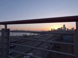 WS T/L TU View of Cars moving on Express Way behind National Assembly in Yeouido Area / Seoul, South Korea Stock Footage