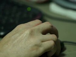 Hand using computer mouse Stock Footage