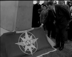 MEMORIAL TO PIONEERS News Clip