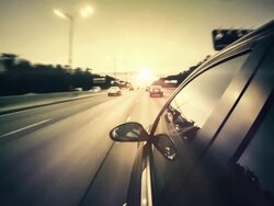 Riding car at sunset Stock Footage