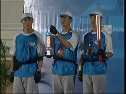 Olympic torch parade cheered on by thousands News Clip