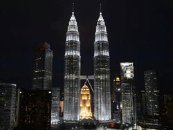 WS View of Petronas Towers at night / Kuala Lumpur, Malaysia Stock Footage