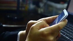 Businessman read on the cellphone Stock Footage