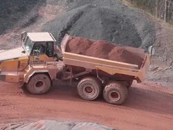 MS Truck with mud passing through  quarry / Taben-Rodt, Hesse, Germany Stock Footage