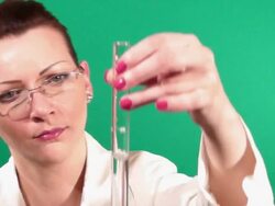 Lab worker checking test tube Stock Footage