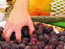 CU Sell of plums at market stall  Stock Footage