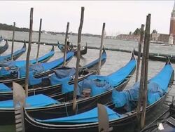 Gondolas parked in San Mark Square - Venice Stock Footage