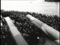 United States President Franklin D. Roosevelt and British Prime Minister Winston Churchill attend a prayer service with military officers as part of an Atlantic Charter Meeting. News Clip