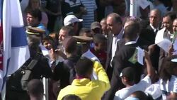 CLEAN: The Olympic flag arrives in Rio's favelas News Clip