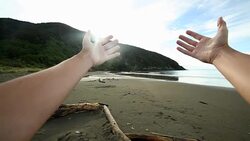 POV Woman's arms stretch towards a beautiful beach Stock Footage