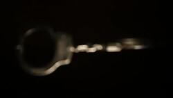 Blurred rolling Handcuffs Stock Footage