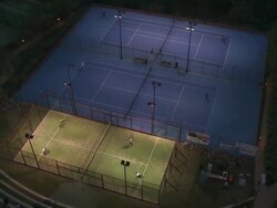 MS View of Tennis and Paddle court at Night / Malaga, Andalusia, Spain Stock Footage