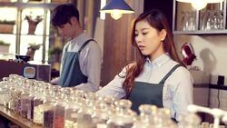waiter and waitress in modern cafe Stock Footage