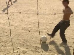 MS TS Shot of kids playing football on ground / Buenos Aires, Argentina Stock Footage