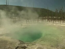 Long Shot static - Steam billows from a hot mineral spring in Wyoming. / Wyoming, USA Stock Footage
