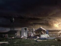 Medium Long Shot hand-held - Rubble and debris litter the yard of a country home after a storm Stock Footage